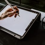 Artist drawing on a tablet for digital illustration