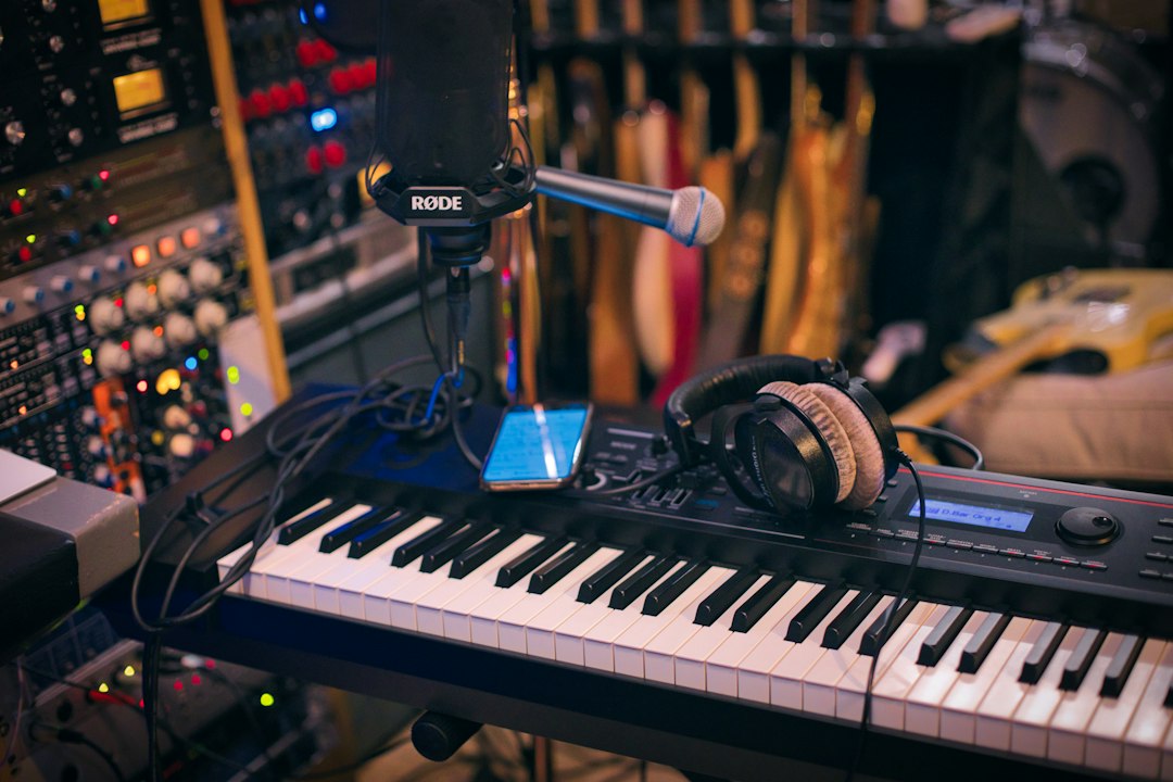 Music production setup with synthesizer keyboard